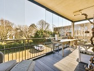 Permessi condominiali montaggio vetrate appartamento